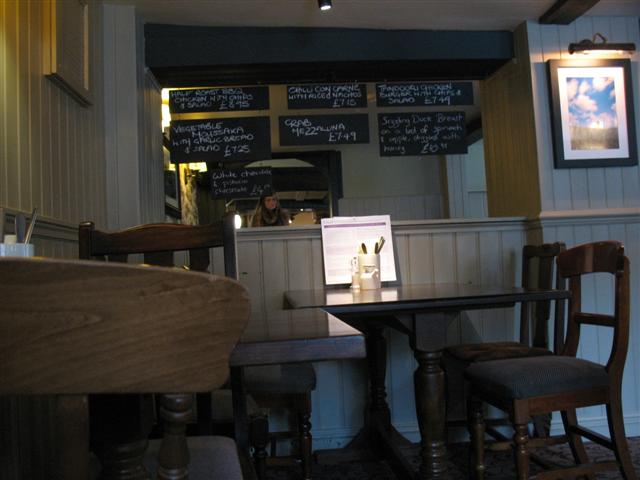 The Burley Ghost 1 (Small) The Burley Ghost 1 - look how the woman's hair seems to obscure the price on the chalk board.